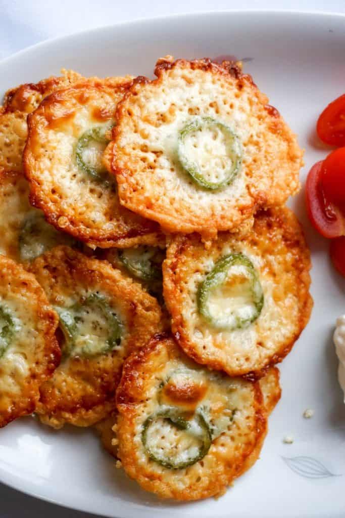 Our keto jalapeno cheese crisps are crunchy and spicy! Perfect to eat by themselves or with one of out low carb dips!